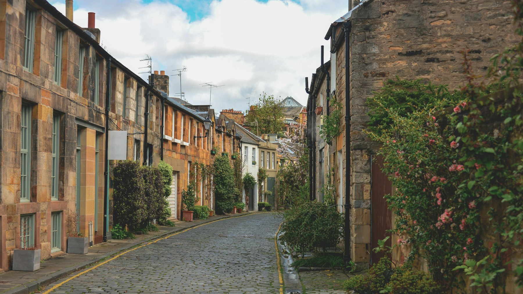 Traditional stone homes on a residential street in Edinburgh